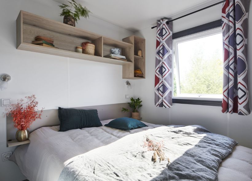 image Inviting bedroom with soft bedding and natural touches, creating a warm ambiance.