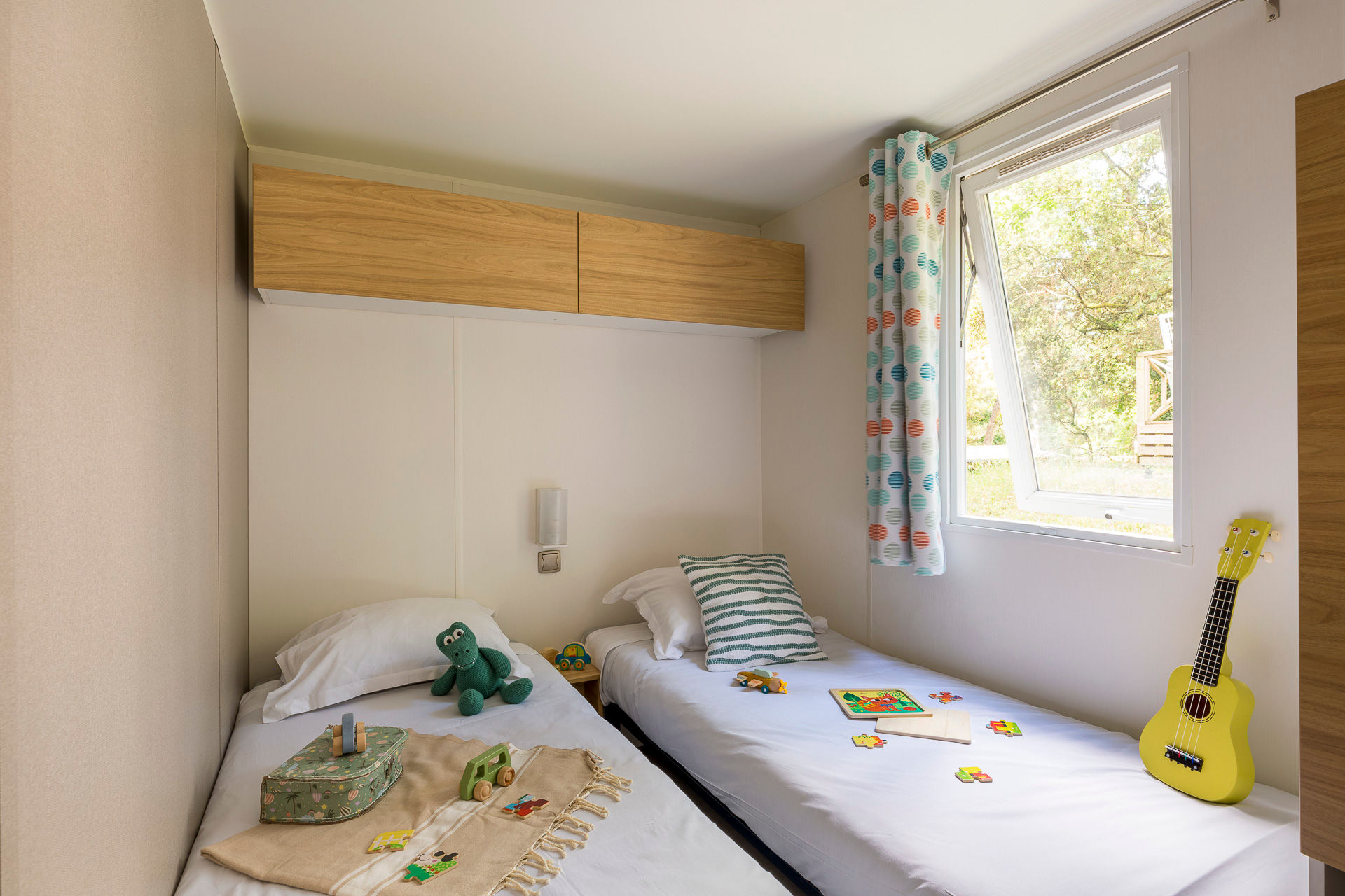 image A restful bedroom with soft lighting and simple decor, providing a tranquil retreat for a good night’s sleep.
