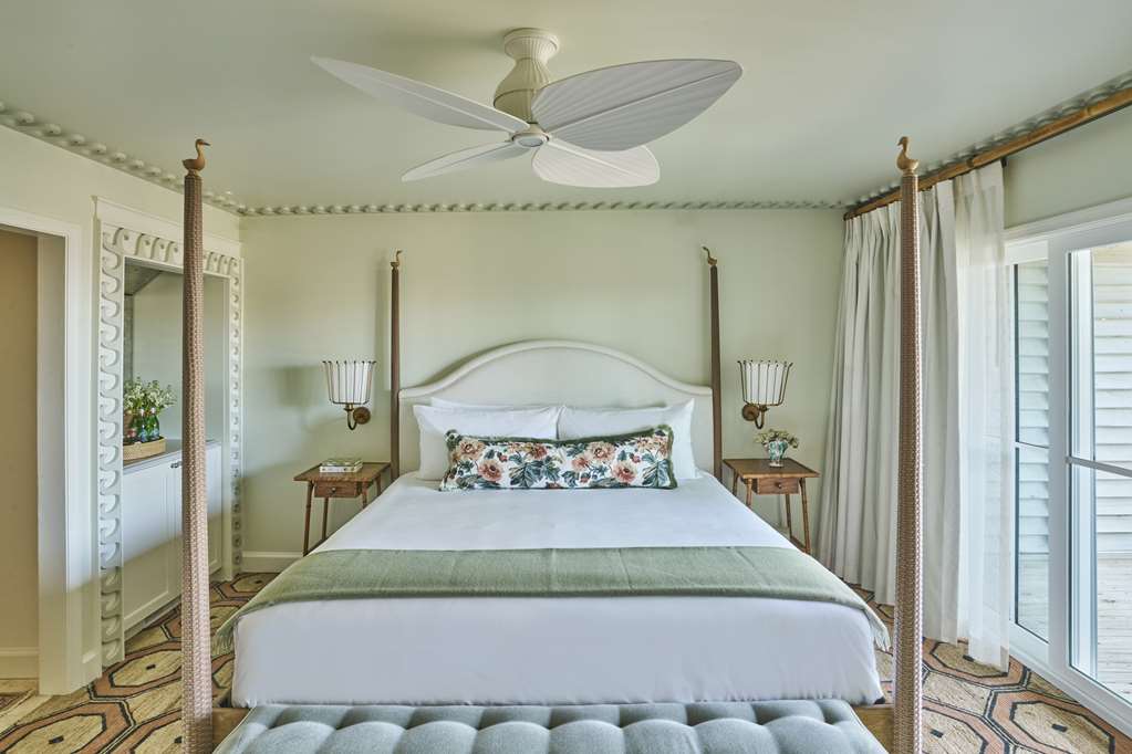 image Wake to soft ocean breezes drifting through sunlit shutters and coastal charm in every detail.