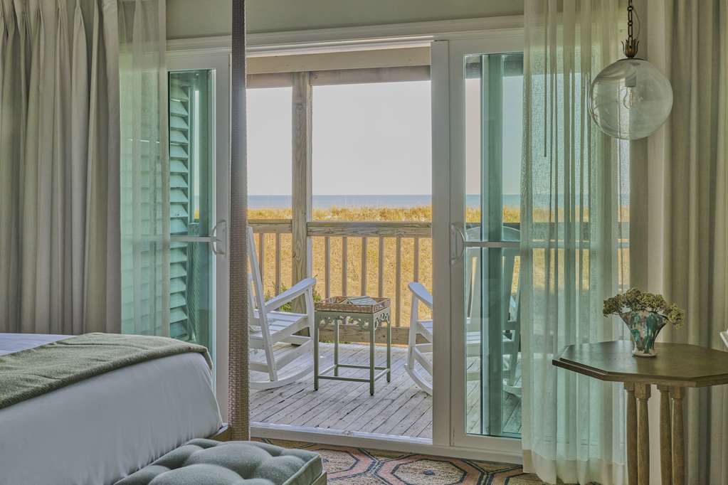image Greet each day with the gentle shimmer of the ocean just beyond your private balcony escape.