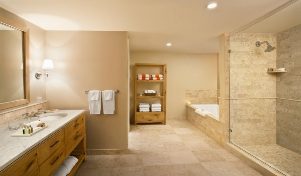 image Sunny and serene bathroom with spa-like features.