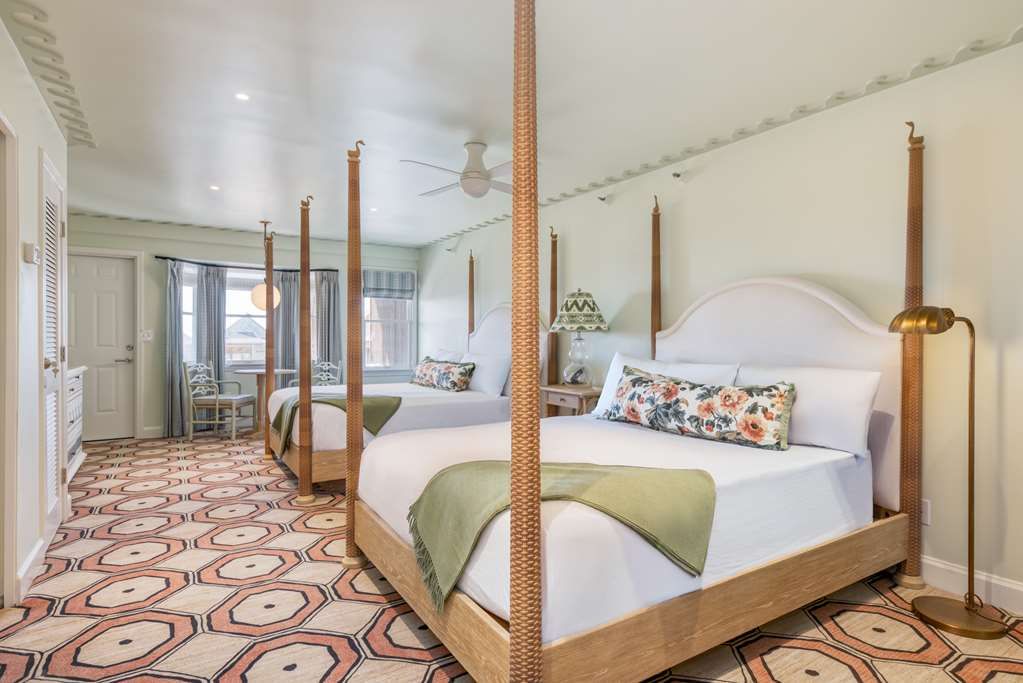 image Stretch out in spacious comfort where classic design and calming tones make every stay unforgettable.