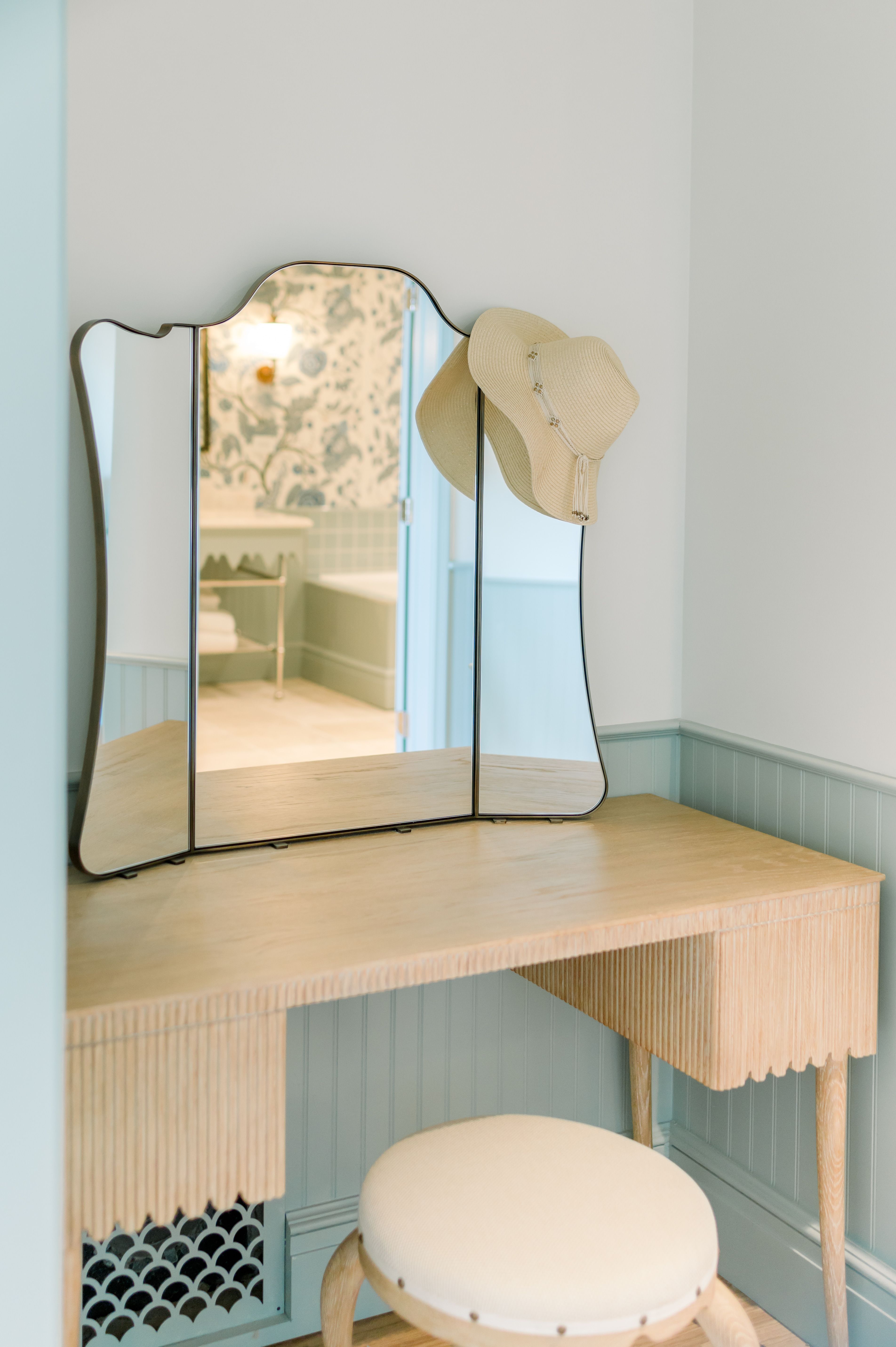 image Ease into your morning at a graceful vanity where soft lighting and gentle textures invite calm and clarity.