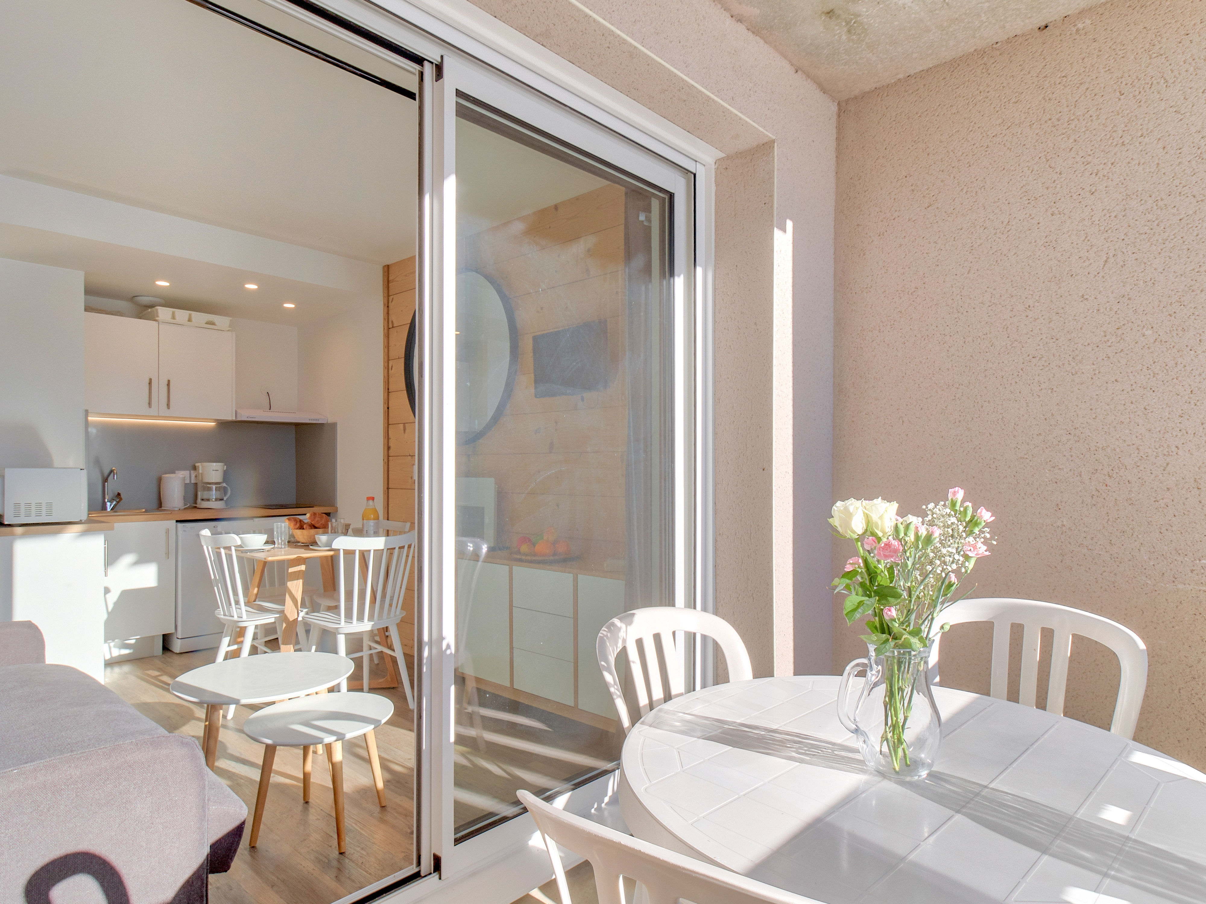 image Airy dining space with open access to the balcony for an indoor-outdoor dining experience.