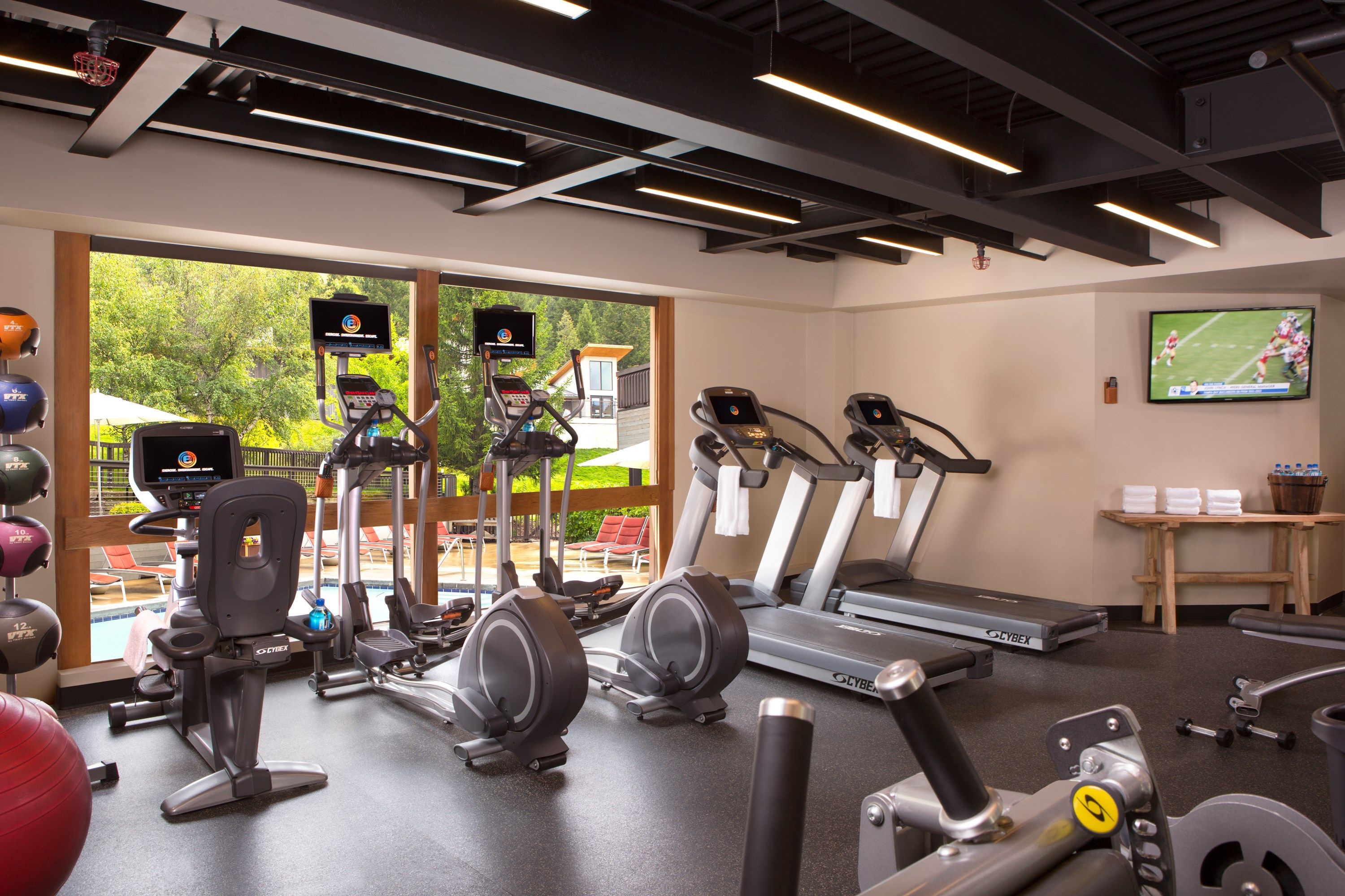 image Stay active in this well-lit workout space, offering a refreshing environment for your routine.