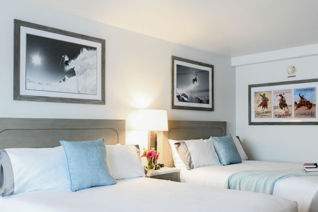 image Cozy and inviting bedroom with plush pillows and elegant decor