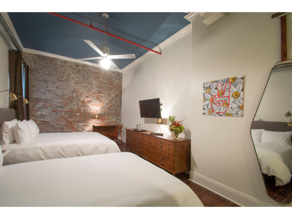 image Urban tranquility highlighted by modern art in a restful bedroom