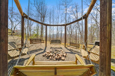 Cozy up by the fire pit or sway on the porch swings, enveloped by nature and the peaceful ambiance of the Smokies.