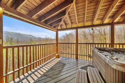 Soak in panoramic Smoky Mountain vistas from the comfort of your private hot tub, the perfect unwind after adventurous days.