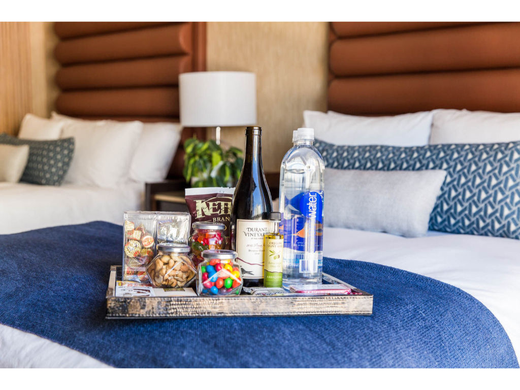 image A welcoming room thoughtfully designed with two double beds and accessible features for ease and comfort.
