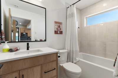 Elegant bathroom with a walk-in shower and contemporary fixtures, perfect for a refreshing start to your day.