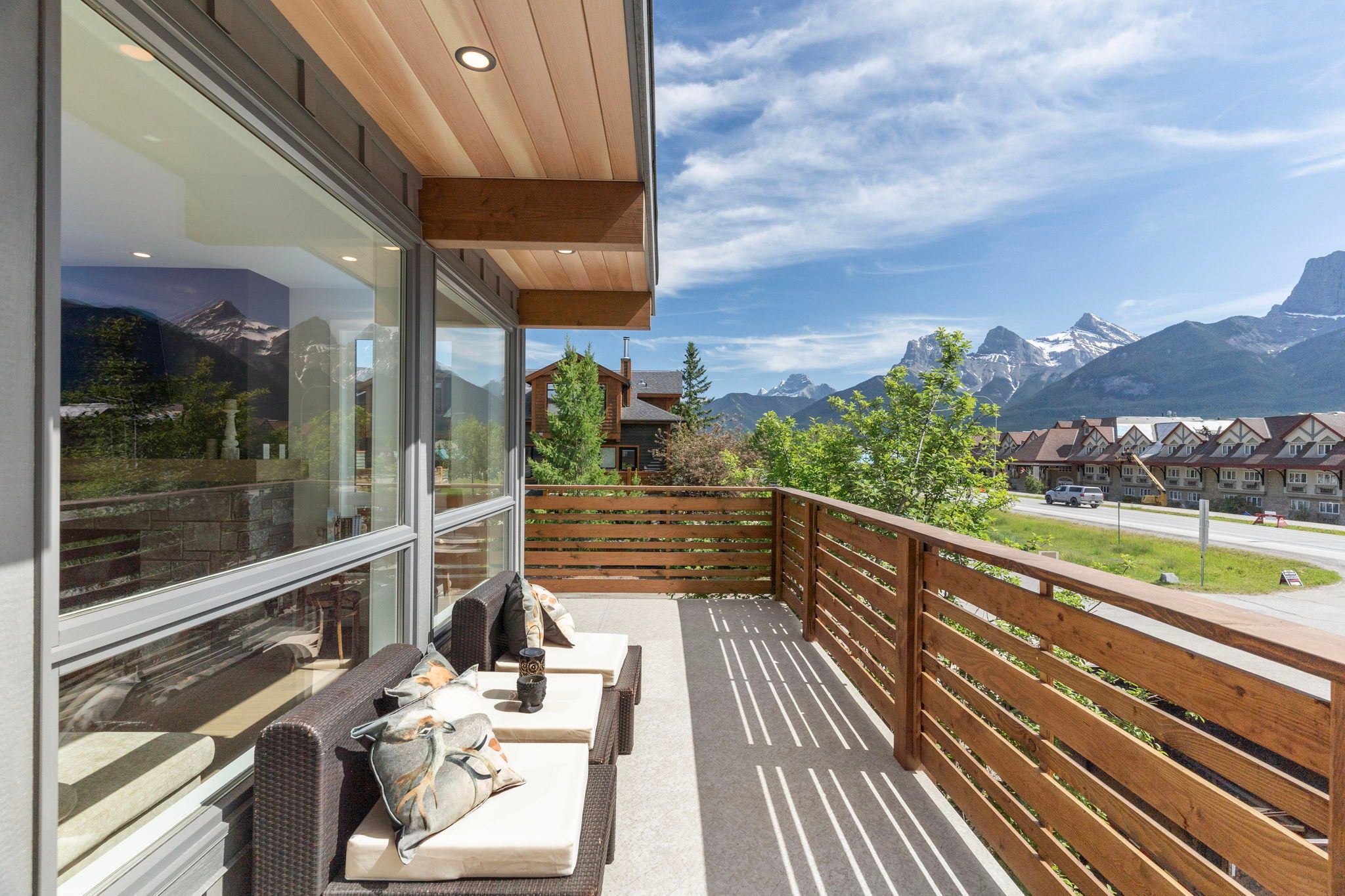 image Take in the panoramic mountain views from the spacious wraparound deck, perfect for morning coffee or evening relaxation.