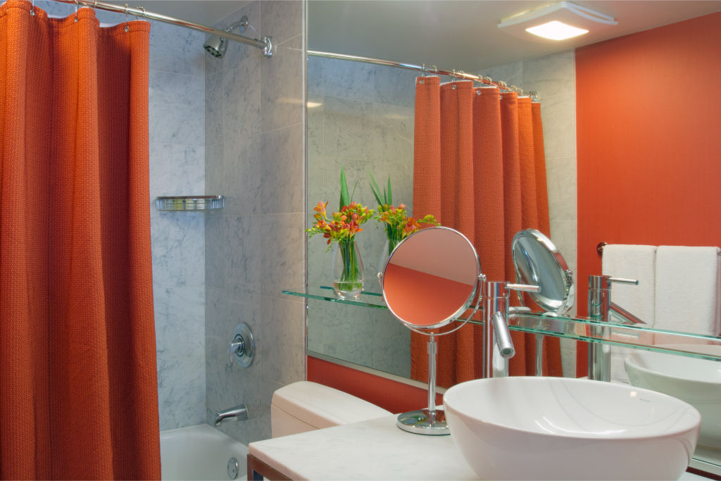 image Modern bathroom with bright details, offering a refreshing and cheerful start to the day with sleek amenities.
