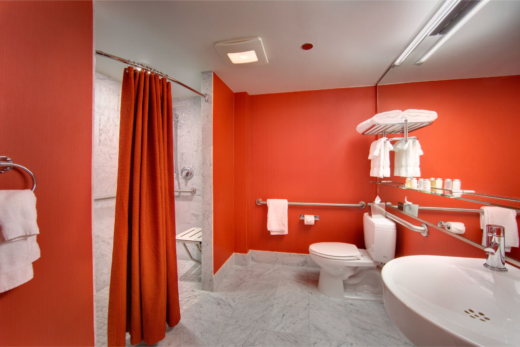 image Eclectic and stylish bathroom, complete with striking fixtures and vibrant decor, ensuring a lively and refreshing environment.