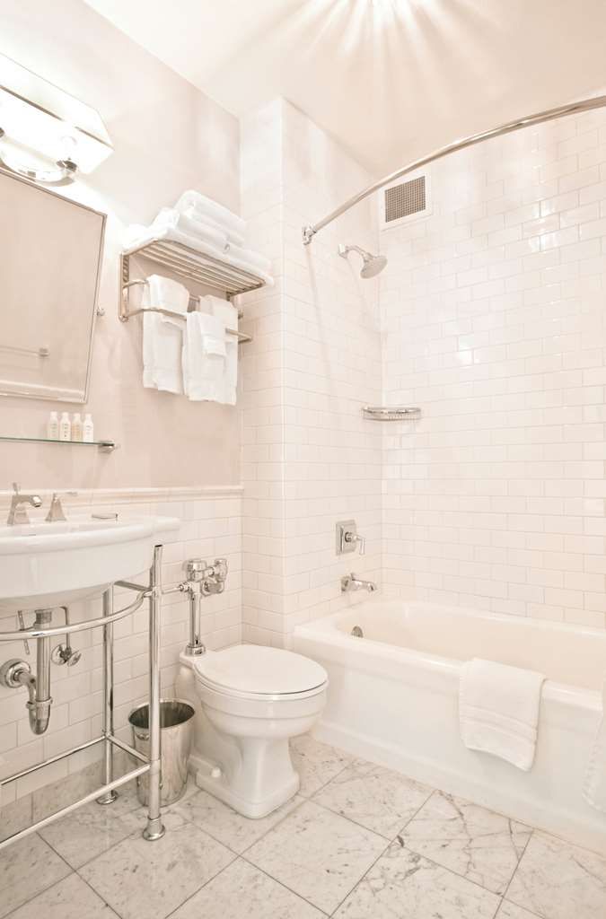 image Our well-appointed bathroom offers modern fixtures, a spacious layout, and all the essentials for your convenience.