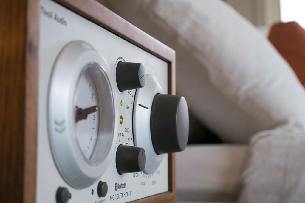 image Enhance your in-room experience with our Tivoli Bluetooth speaker, delivering high-quality sound for your entertainment.