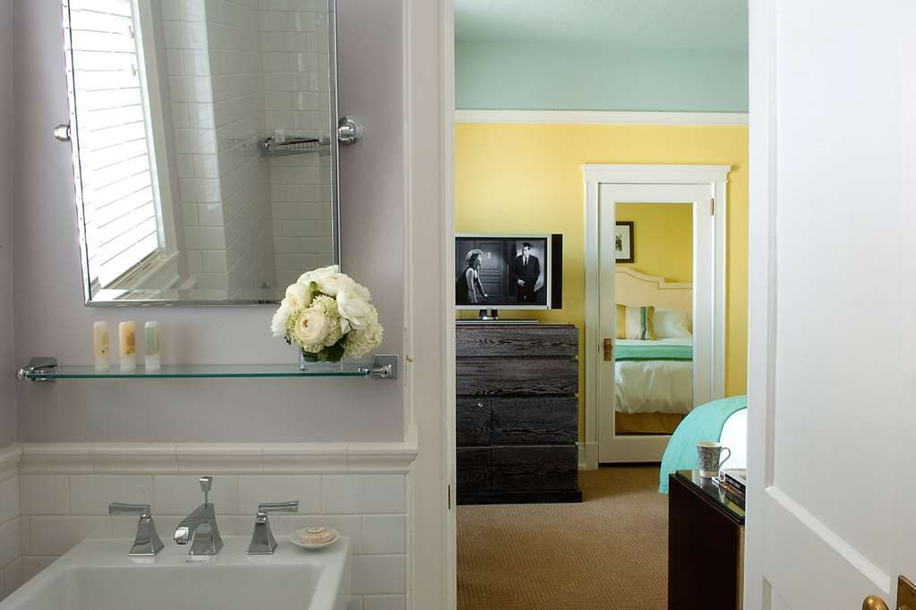 image Elegant ensuite design that blends seamlessly with a cozy adjoining bedroom.