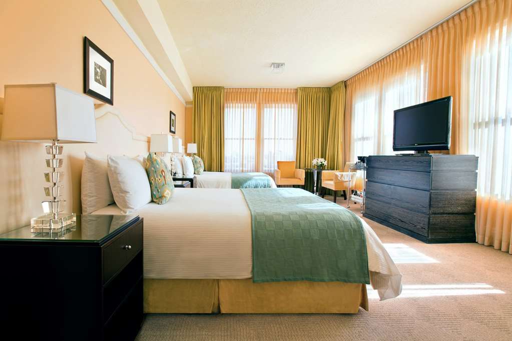 image Our double queen room offers ample space and comfort, perfect for families or friends traveling together.