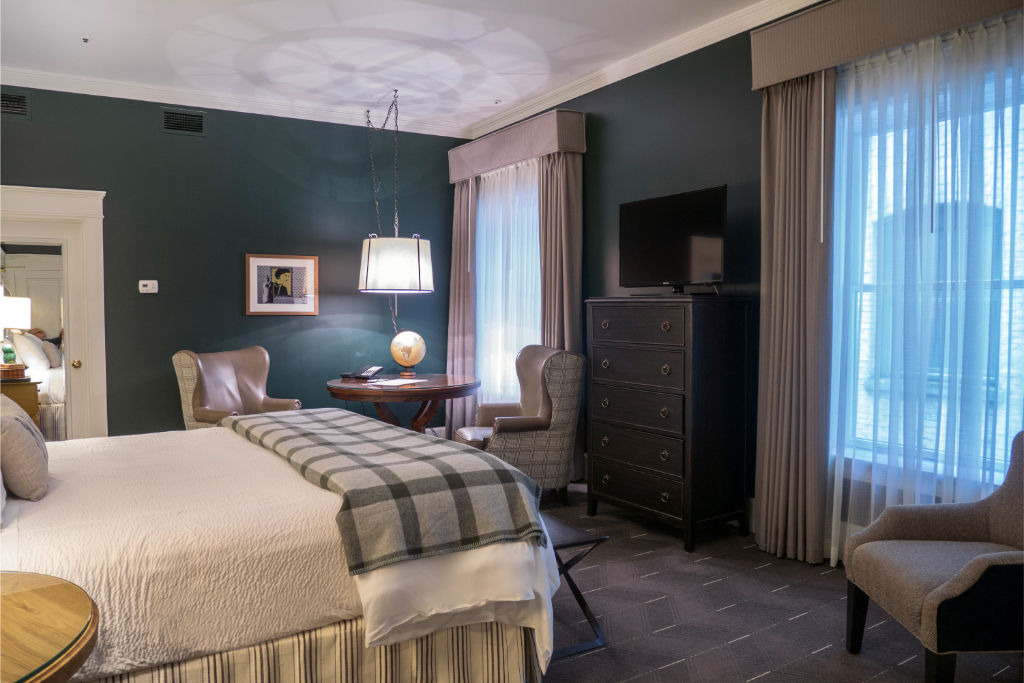 image Rest comfortably in this elegant ADA-compliant bedroom featuring high-quality bedding, modern decor, and a serene atmosphere.