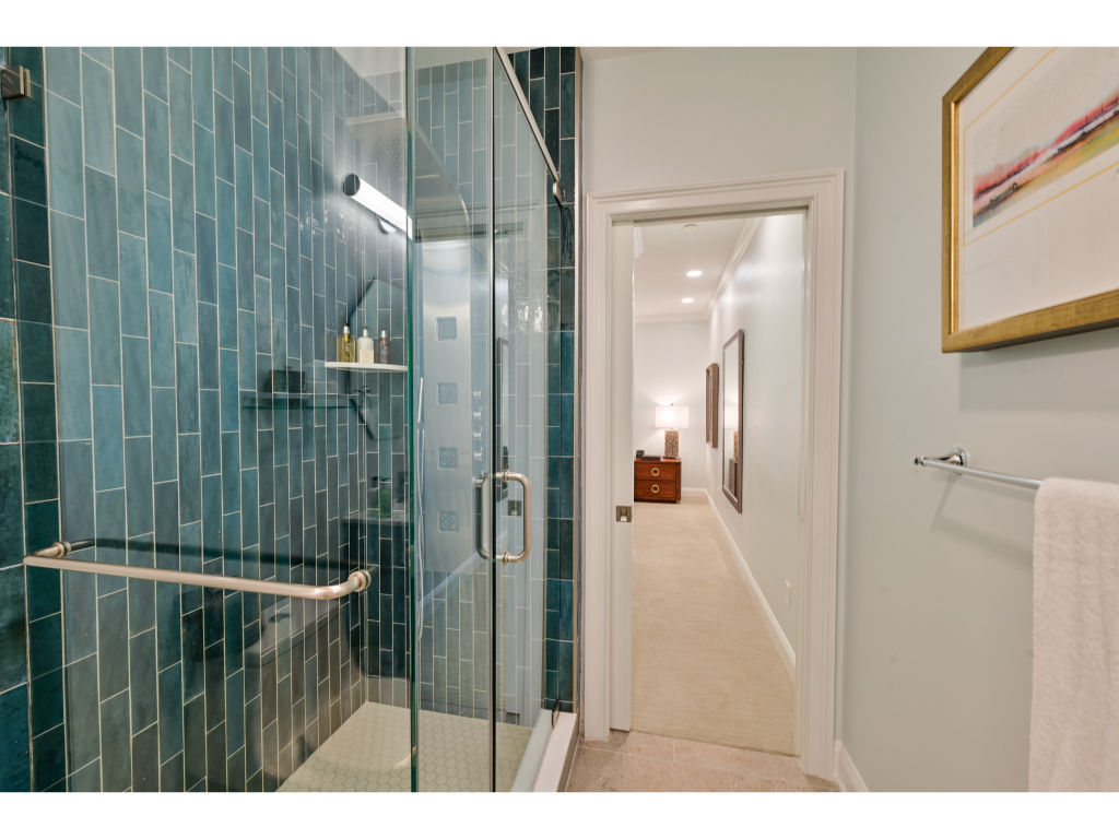 image Luxurious bathroom with a walk-in shower and contemporary fixtures for a spa-like experience.