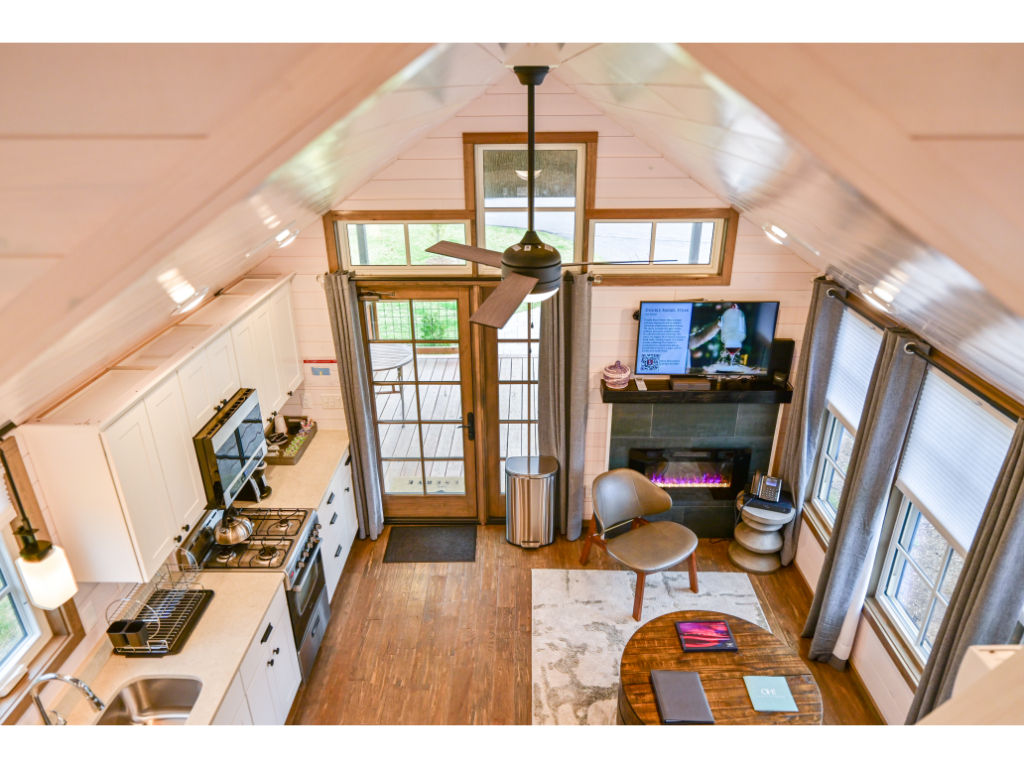 image Enjoy the open-concept design with ample natural light, modern furnishings, and stunning views through large windows.