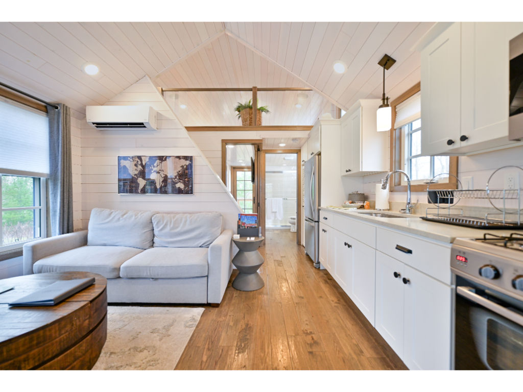 image The kitchen seamlessly flows into the cozy living room, perfect for relaxing and entertaining.