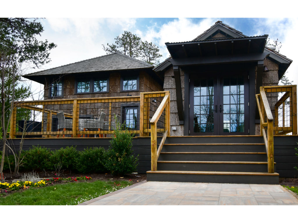 image Enjoy the outdoors on the expansive deck, perfect for morning coffee or evening relaxation.
