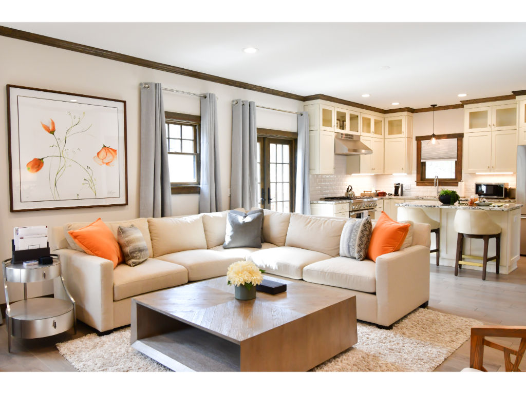 image Comfortable living area with plush seating, vibrant decor, and ample natural light.