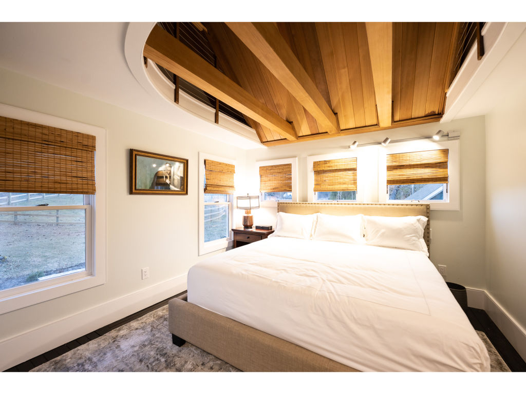 image A beautifully furnished bedroom that promises a good night's sleep and relaxing mornings.