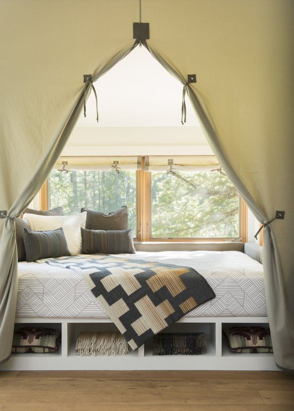 image Rustic charm meets comfort in this beautifully decorated bedroom.