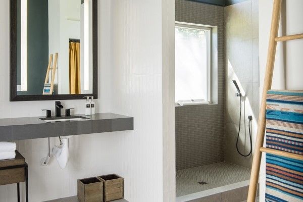 image Refresh in a sleek, modern bathroom featuring elegant fixtures and abundant natural light.