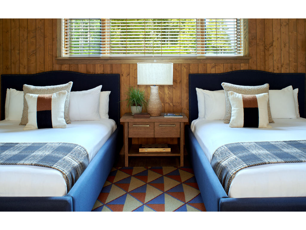 image Generous and charming bedroom with two beds, offering a haven of tranquility for a perfect night's rest.