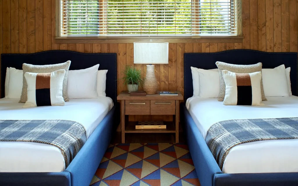 image Generous and charming bedroom with two beds, offering a haven of tranquility for a perfect night's rest.