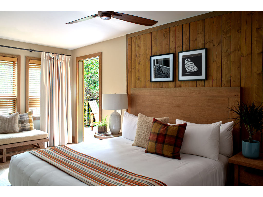 image Bright and cozy bedroom with modern decor and plenty of natural light.