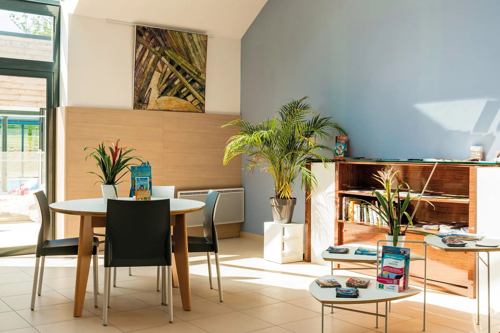 image Find peace and relaxation with your close friends and family in this stunning open-concept living room featuring natural decor.