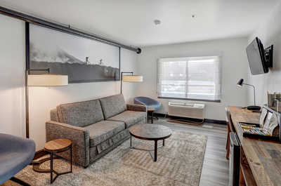 Cozy and stylish living space with warm lighting and modern furnishings, perfect for relaxation after a day of adventure.