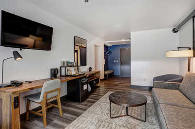 Functional and beautifully designed workspace, ideal for unwinding or catching up on emails in a peaceful setting.