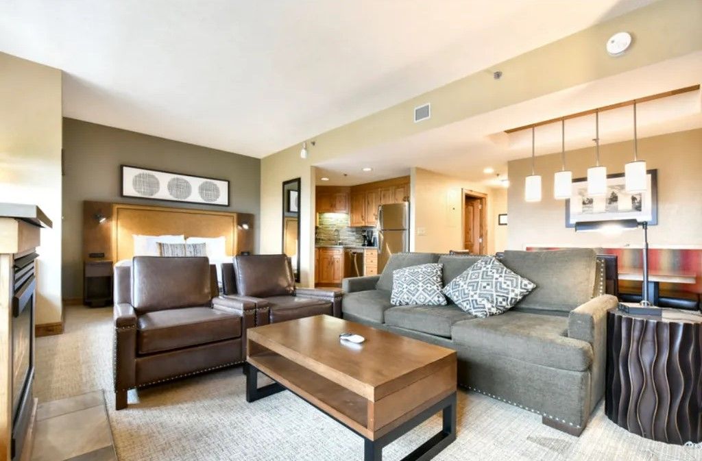 image Cozy living room with comfortable seating and a warm ambiance.