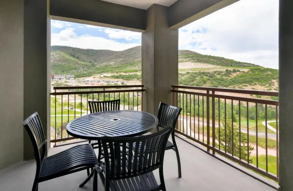 image Private balcony with breathtaking views, perfect for morning coffee.