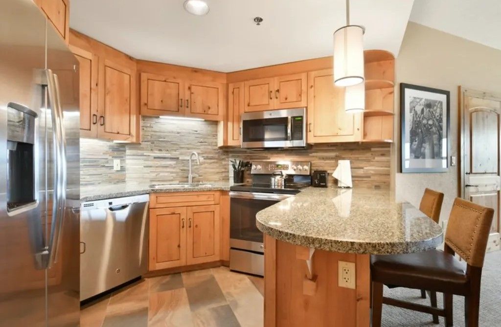 image Fully equipped kitchen with modern appliances for gourmet meals.
