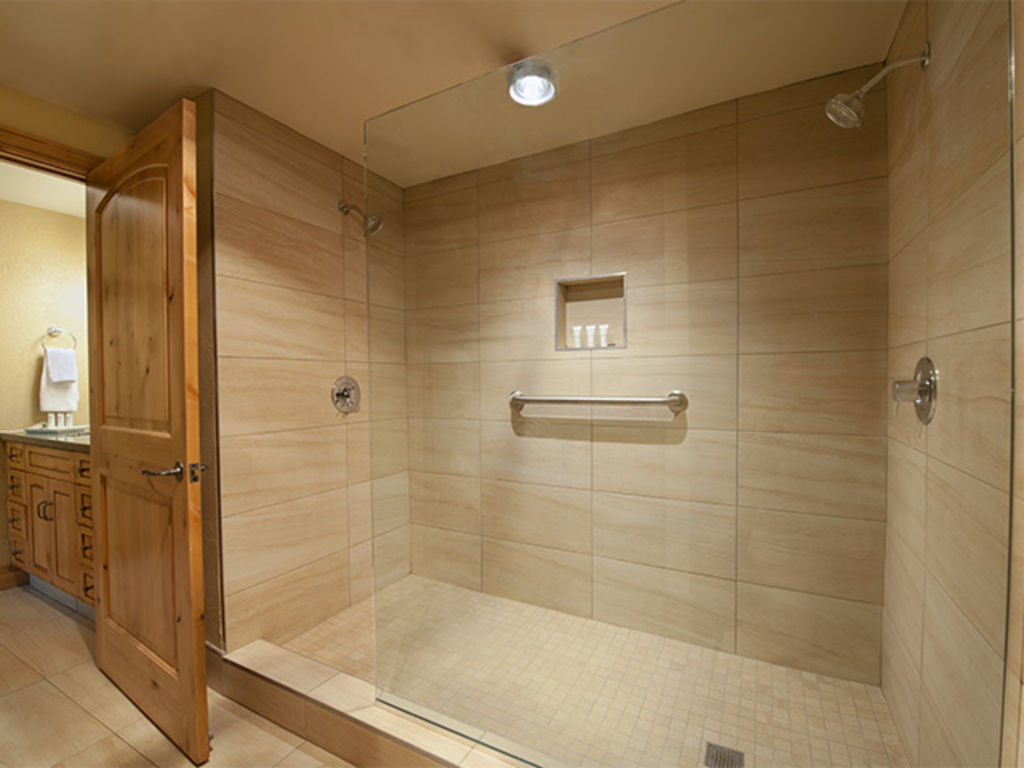 image Luxurious bathroom with a walk-in shower and modern fixtures.