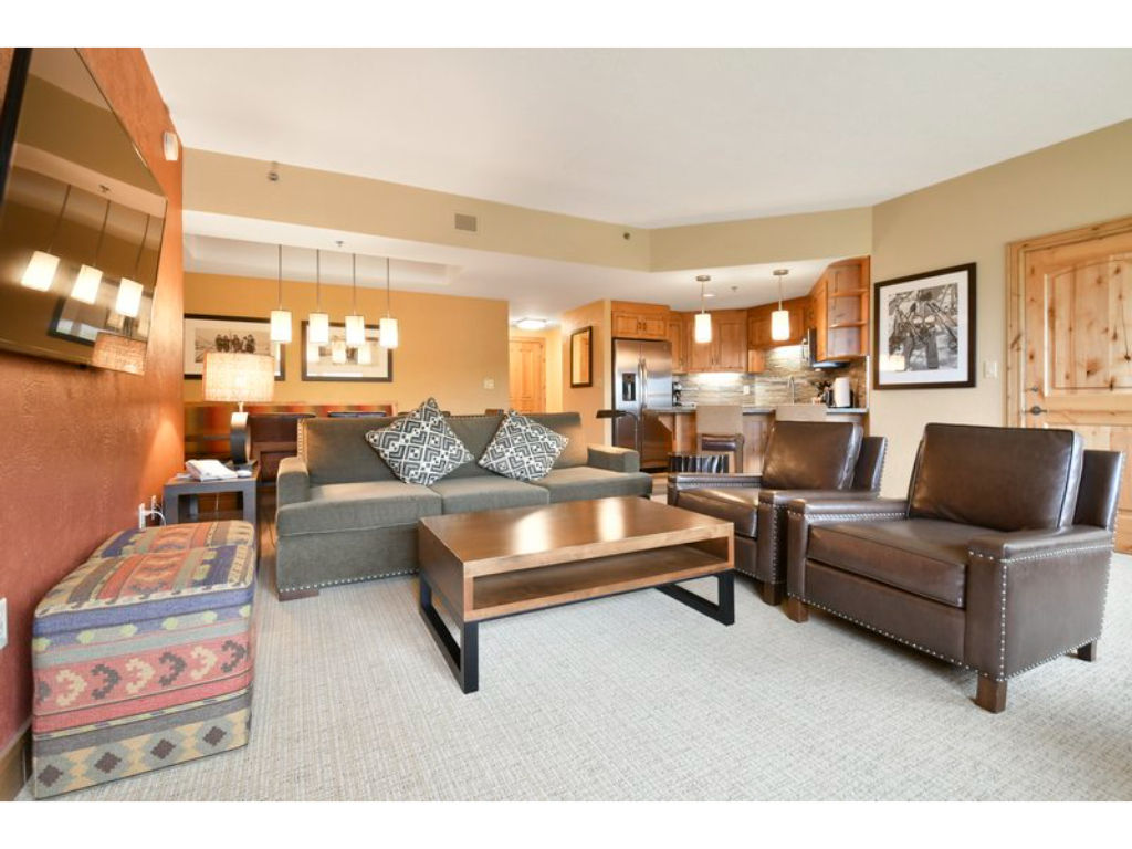 image Inviting living space with comfortable seating and a warm ambiance.