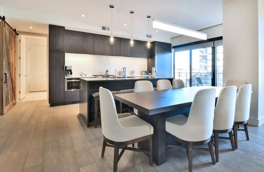 image Sophisticated dining room with stylish decor and ample seating.