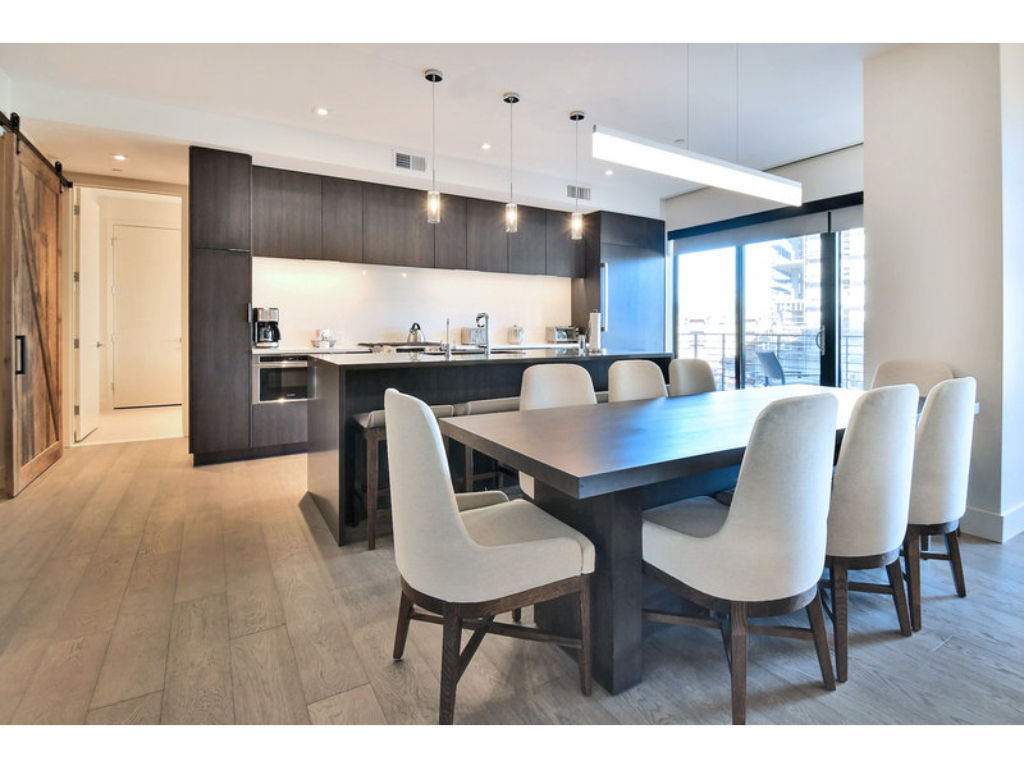 image Sophisticated dining room with stylish decor and ample seating.