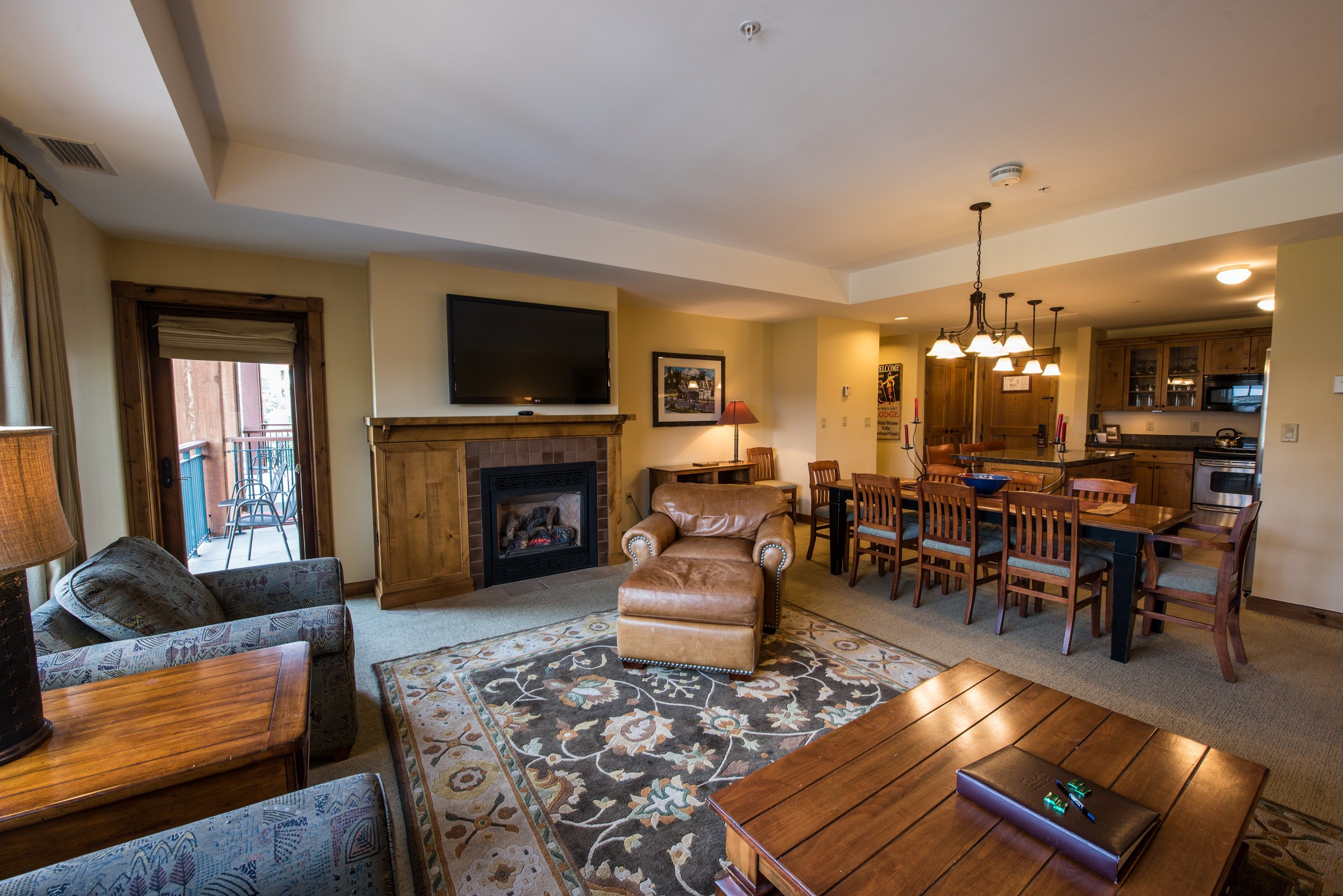 image Find peace and relaxation with your close friends and family in this stunning living room featuring natural decor.