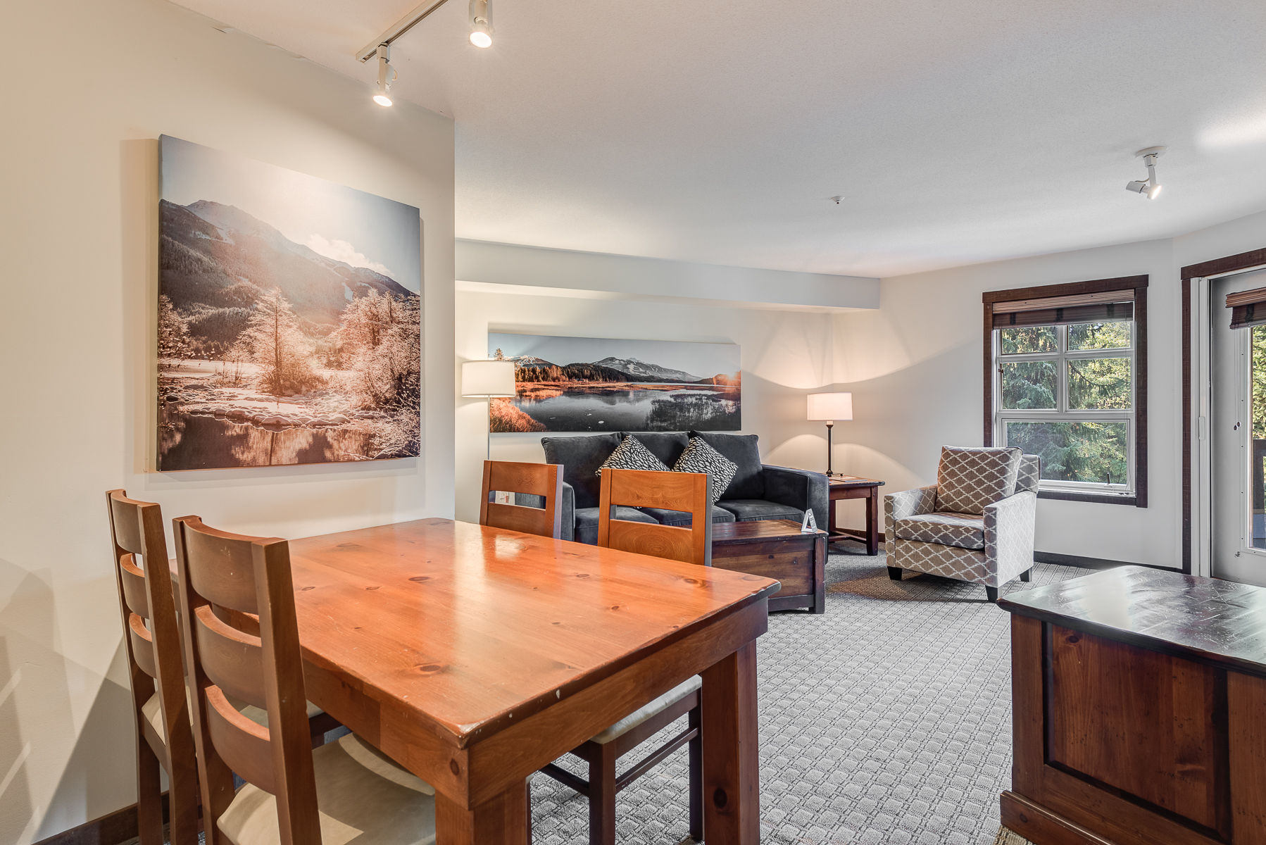 image Spacious dining area with plenty of seating, perfect for meals or gatherings.