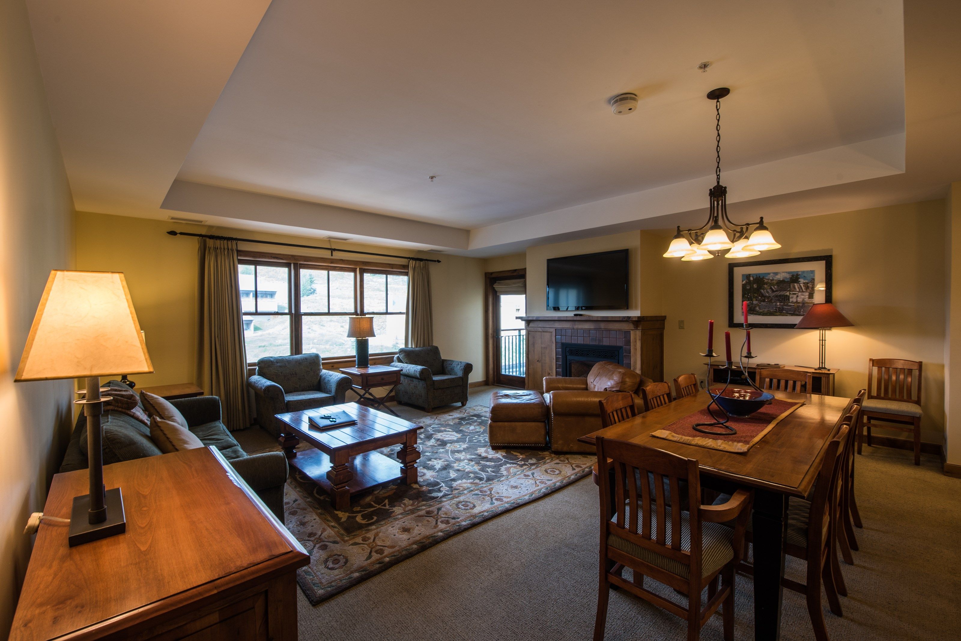 image Find peace and relaxation with your close friends and family in this stunning living room featuring natural decor.