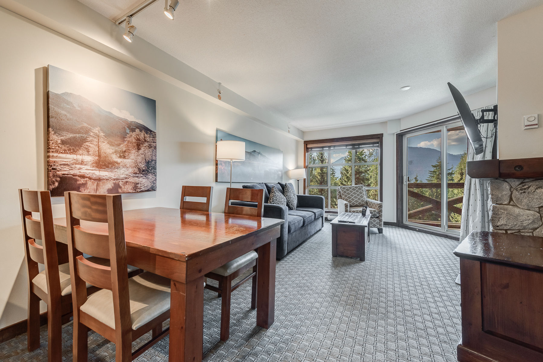 image Open dining area filled with natural light, perfect for shared meals.