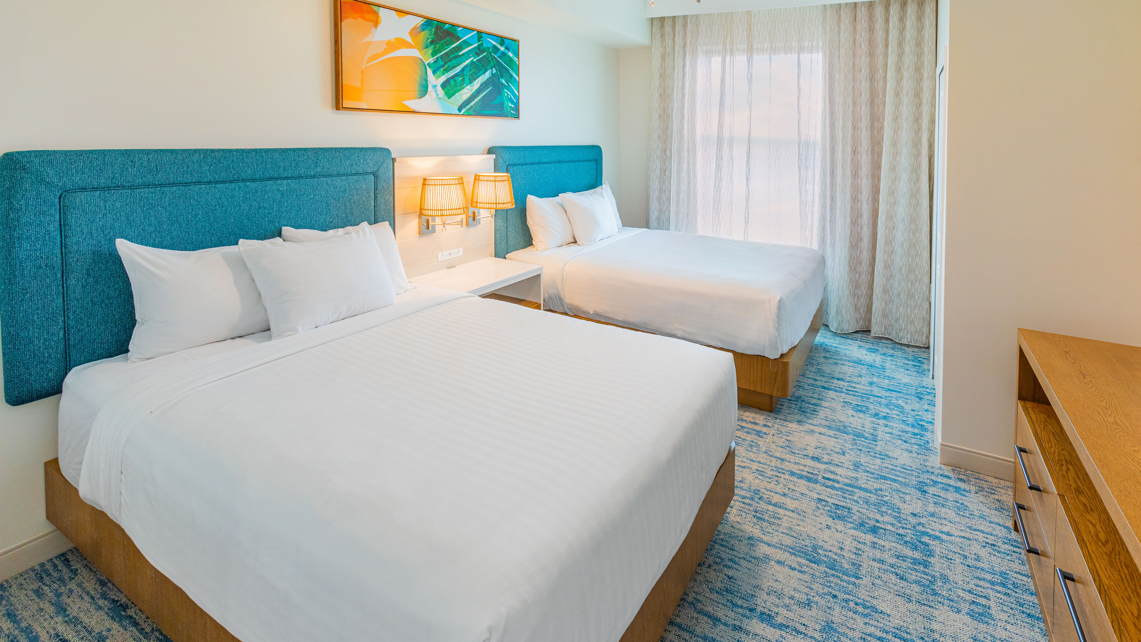 image Bright and spacious bedroom with plush bedding, ideal for a restful and cozy stay.