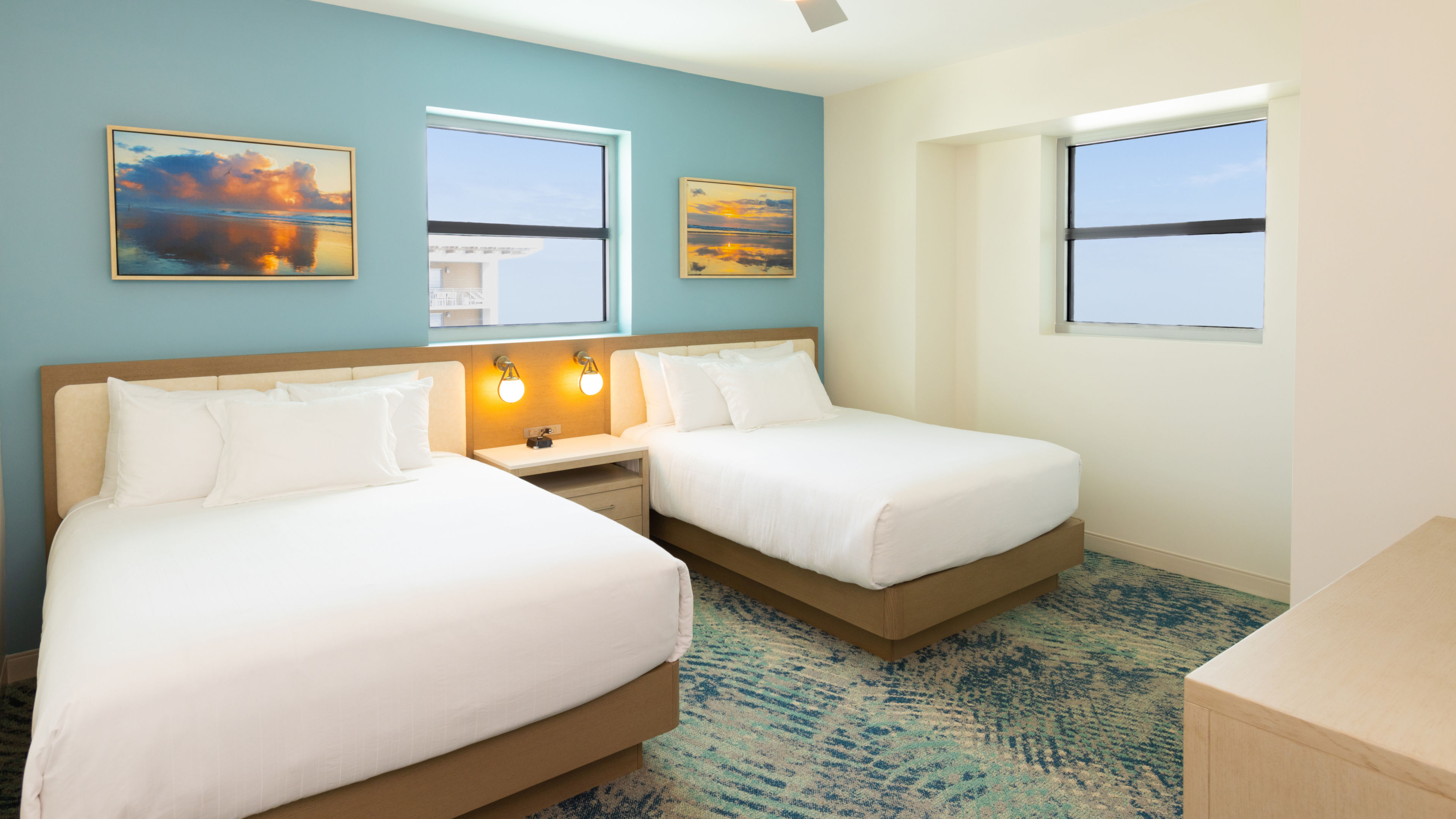 image Sunlit bedroom with twin beds and a serene atmosphere, making it perfect for a relaxing retreat.